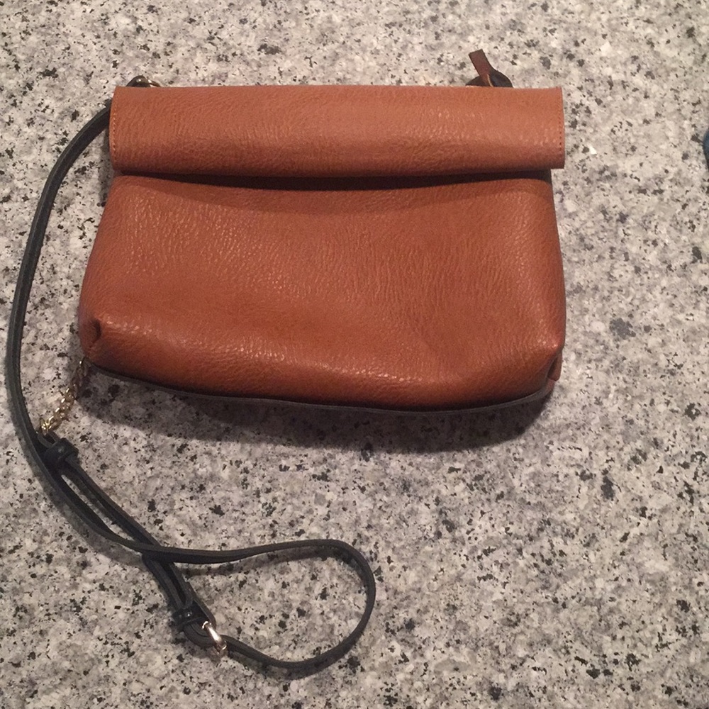 Reversible Crossbody / clutch.